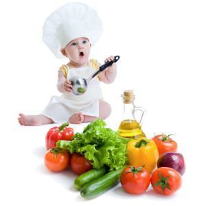 baby boy preparing healthy food isolated